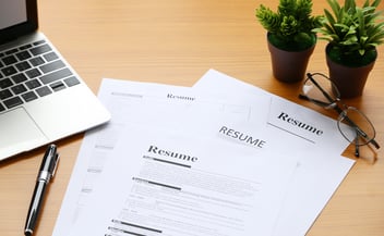 A stack of resumes