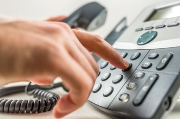 Hand dialing a phone number