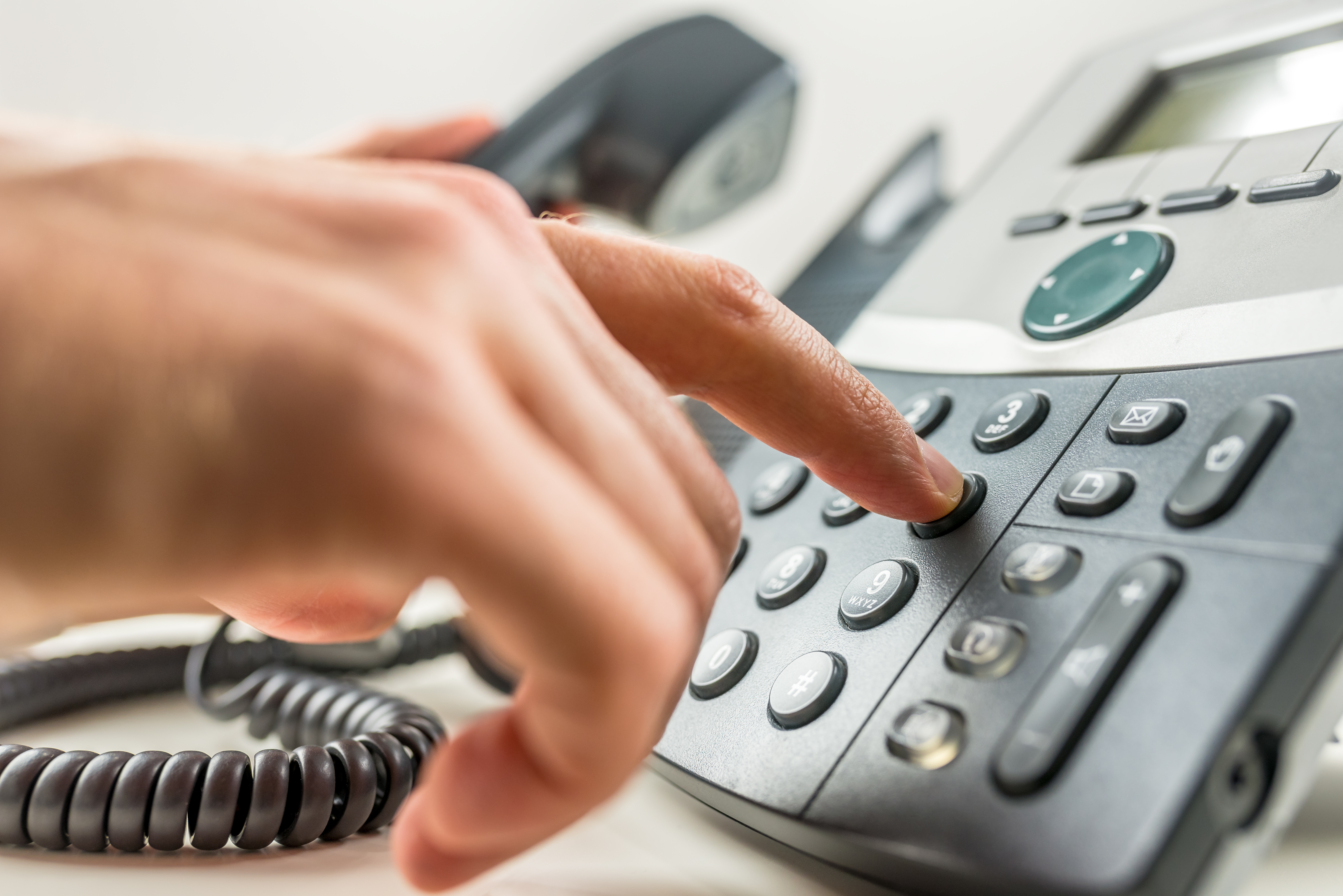 Hand dialing a phone number