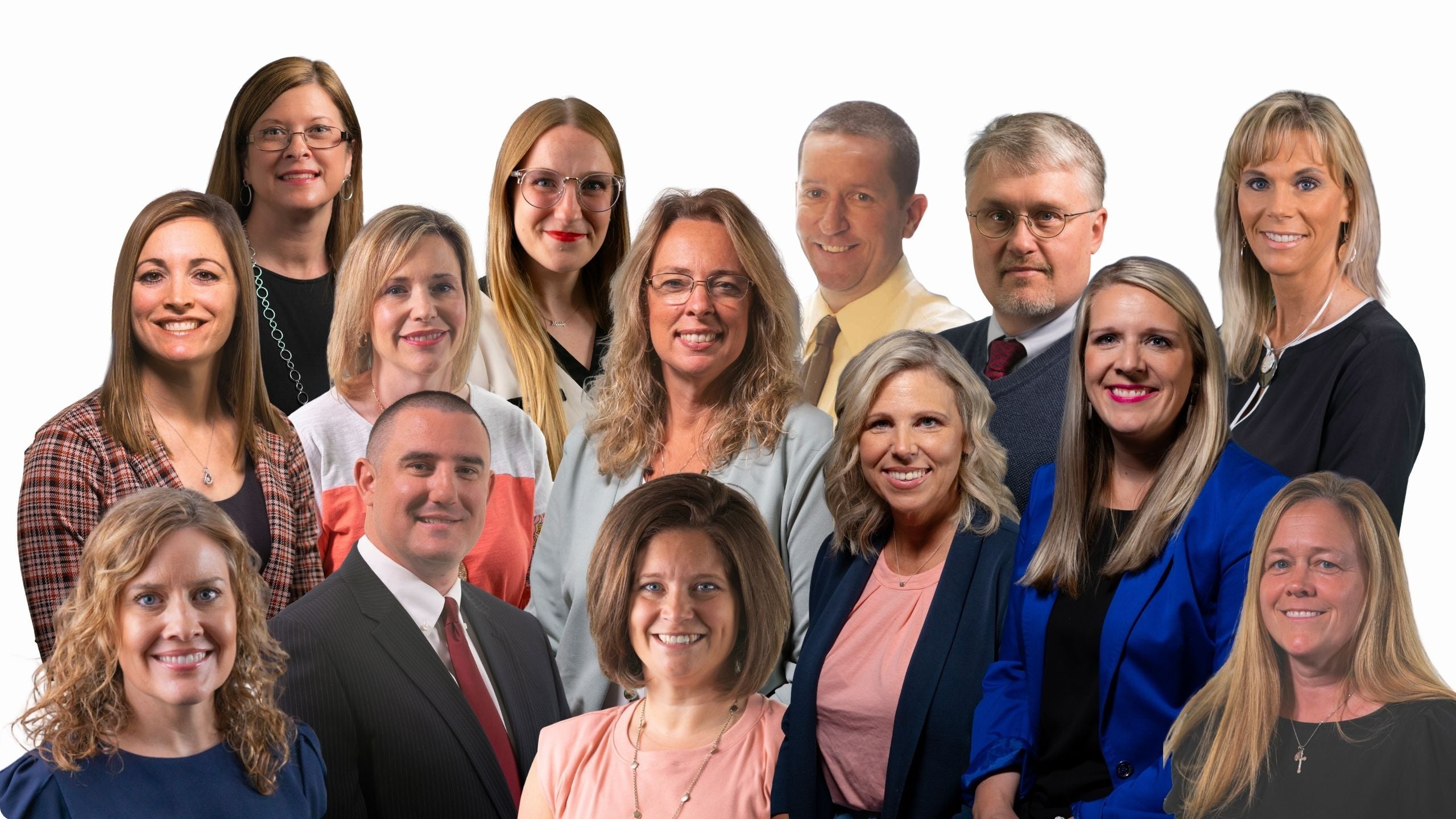 A group of people posing for a photo in front of a white background. They are all smiling and appear to be in a professional setting.